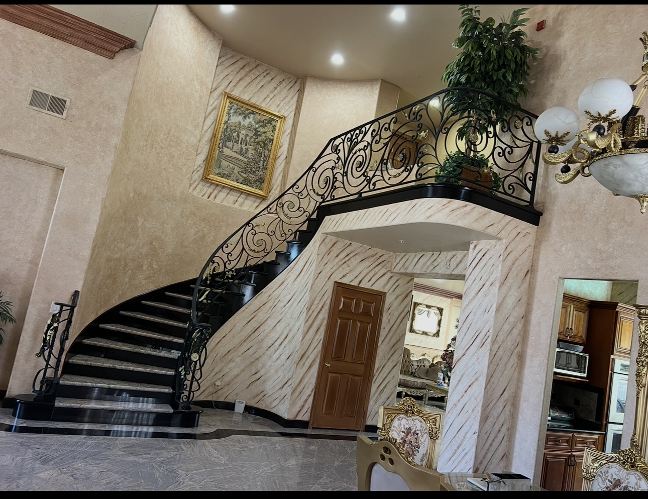 Elegant Custom Staircase with Herringbone Wall Detail